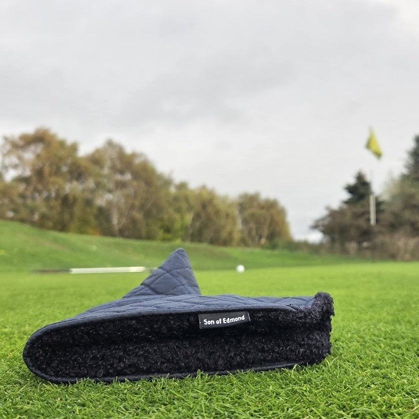 Navy Quilted waxed putter cover with black sherpa fabric lining