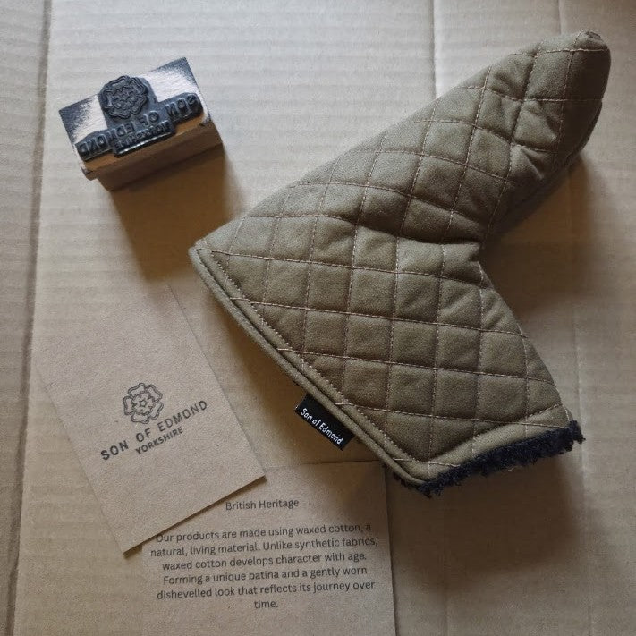 Tan Quilted waxed putter cover with black sherpa lining