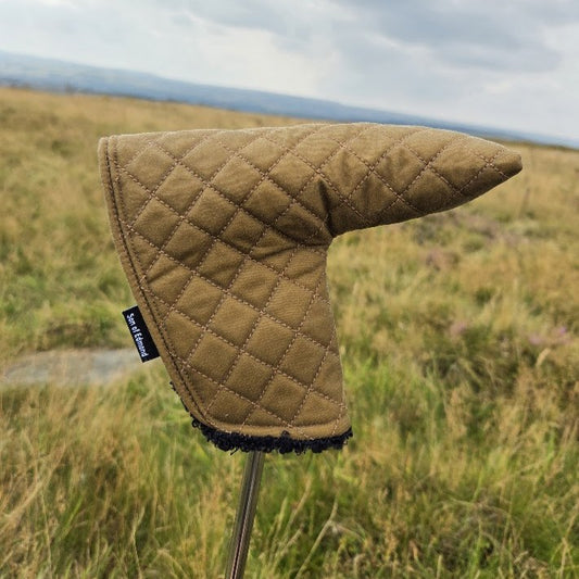 Tan Quilted waxed putter cover with black sherpa lining