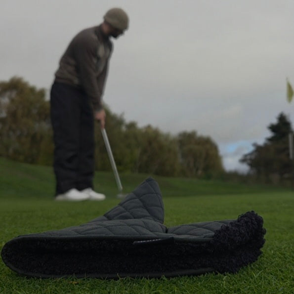 Black Quilted waxed putter cover with black sherpa fabric