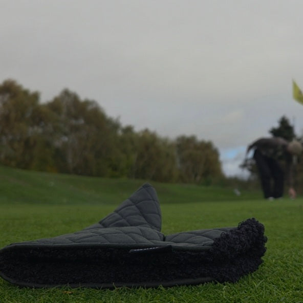 Black Quilted waxed putter cover with black sherpa fabric