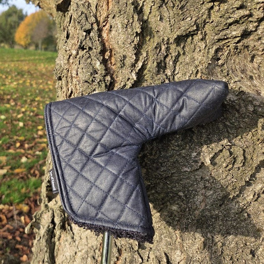 Navy Quilted waxed putter cover with black sherpa fabric lining