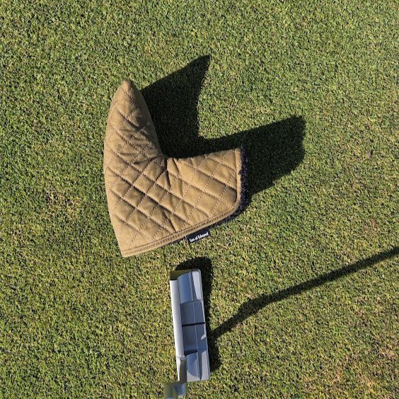 Tan Quilted waxed putter cover with black sherpa lining
