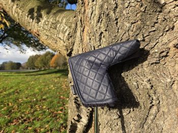 Navy Quilted waxed putter cover with black sherpa fabric lining 